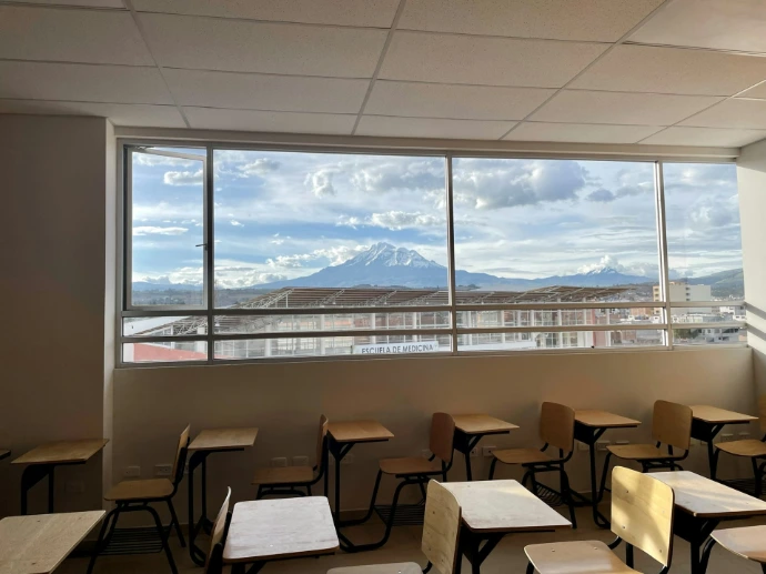 a room with tables and chairs